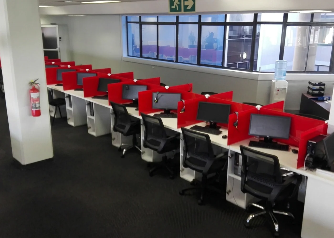 Usured operations floor — headset-ready campaign seats